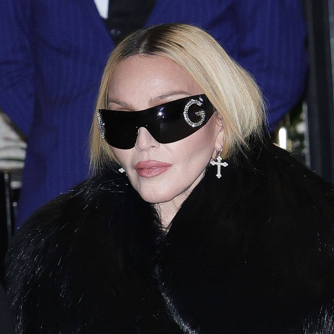 Madonna, 65, steps out in nothing but a fur-lined mini dress and