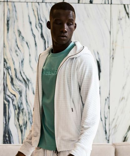 1PIU1UGUALE3 RELAX(ウノピゥウノウグァーレトレ リラックス)3ロゴワッ