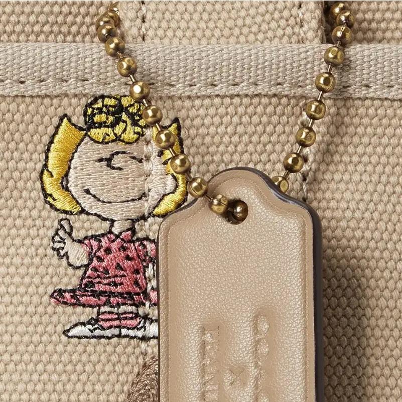 COACH（コーチ） 2025新作 COACH x ピーナッツ コラボ スヌーピー