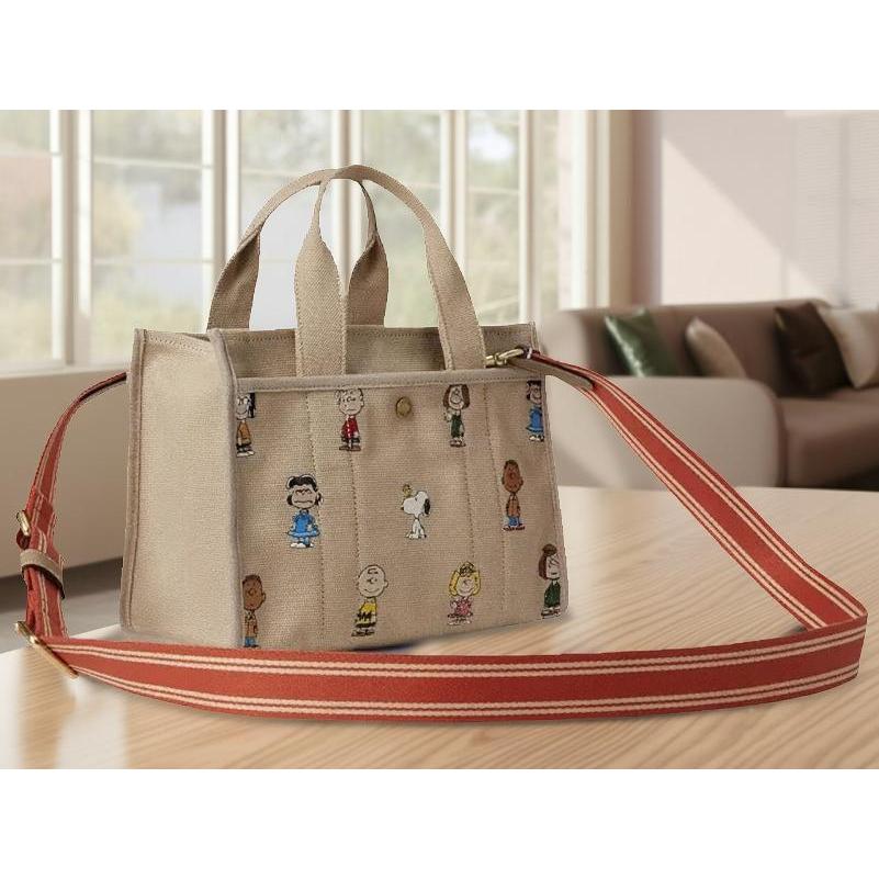 COACH（コーチ） 2025新作 COACH x ピーナッツ コラボ スヌーピー