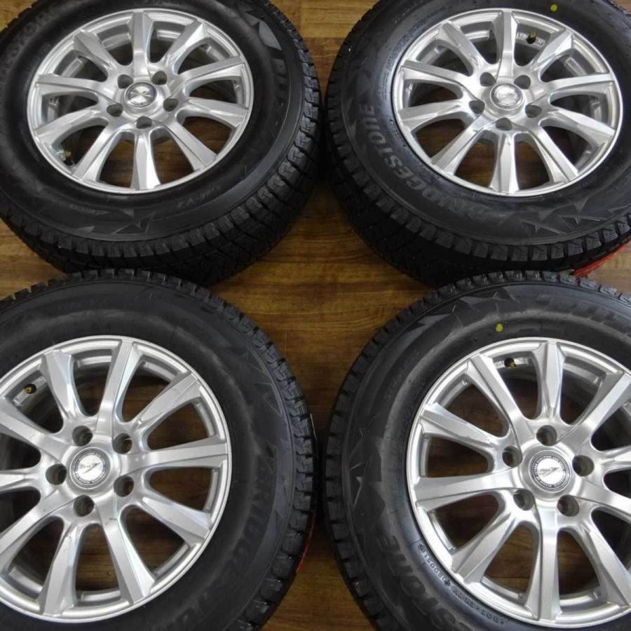 ブリザック DM-V2 会社宛て配送で送料無料 新品スタッドレスタイヤ 215