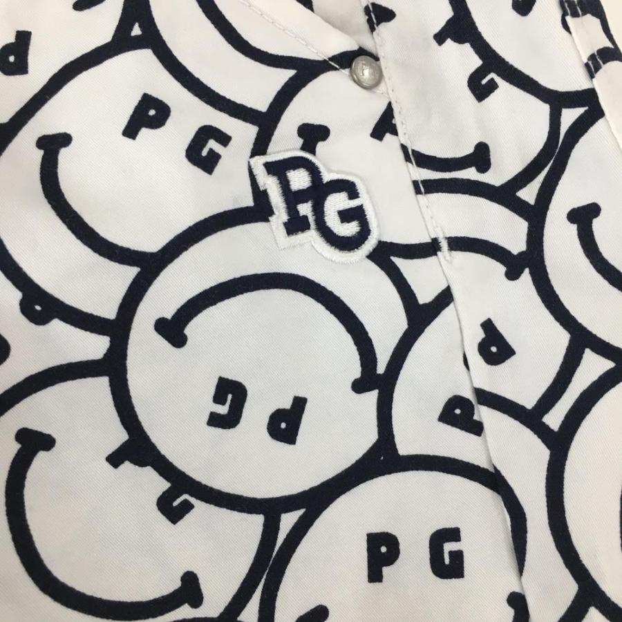 超美品】パーリーゲイツ パンツ 白×ネイビー ニコちゃん総柄 スマイル