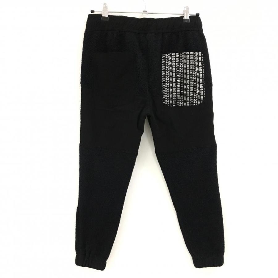 muta MARINE（ムータマリン） ジョガーパンツ 黒 一部ボア ロゴ白 裾