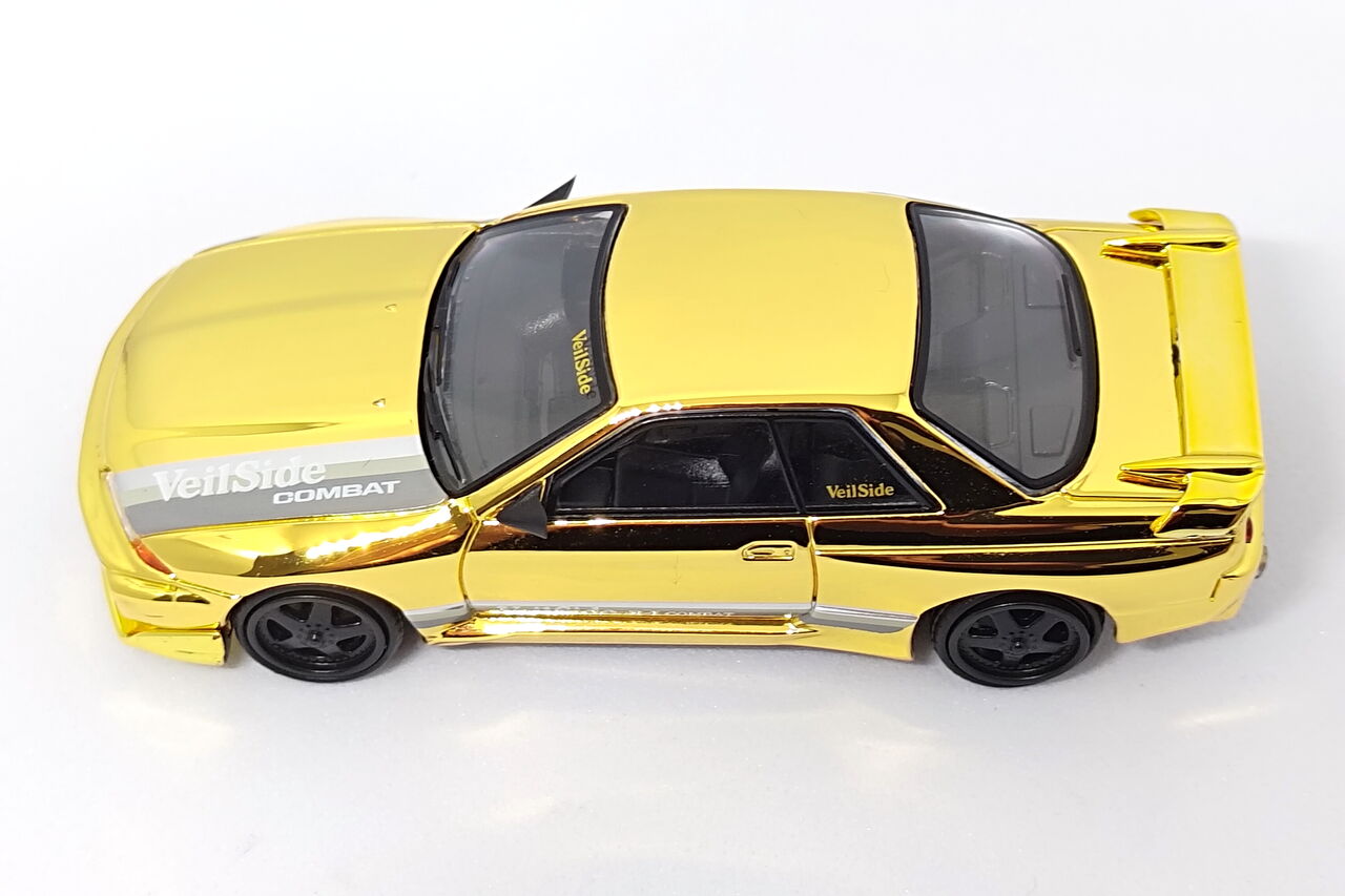 MINI GT 日産スカイラインGT-R(R32) VeilSide Combat C-Ⅰ Gold Chrome