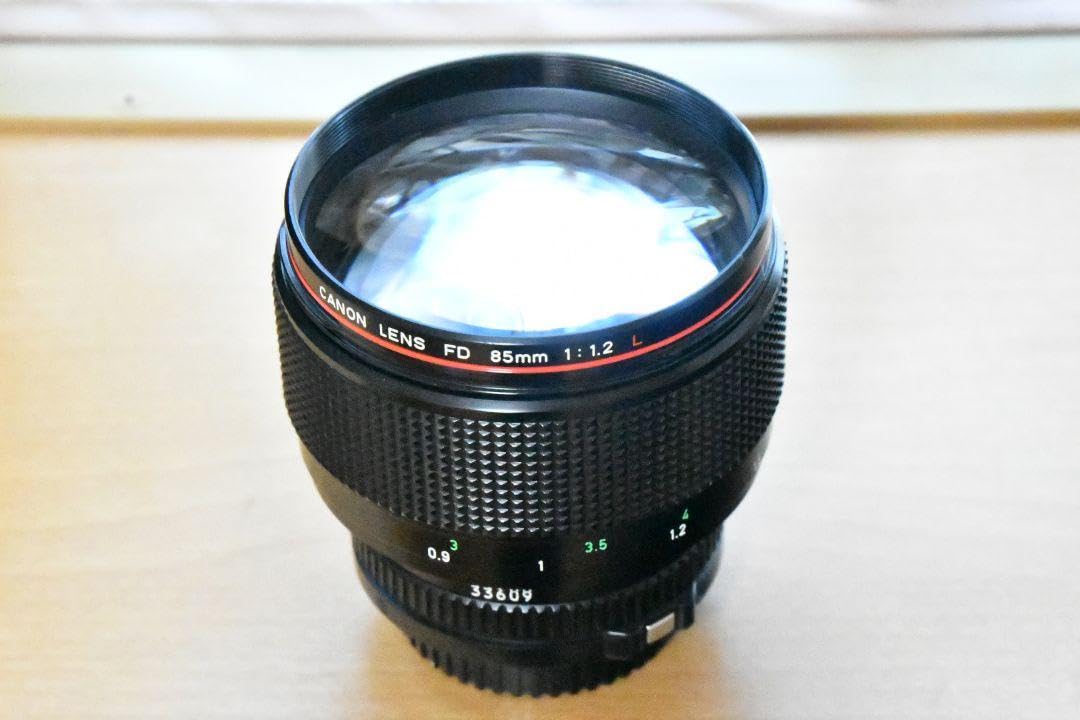 Amazon | オールドレンズ 神 レンズ New FD 85mm F1.2L | カメラ用交換