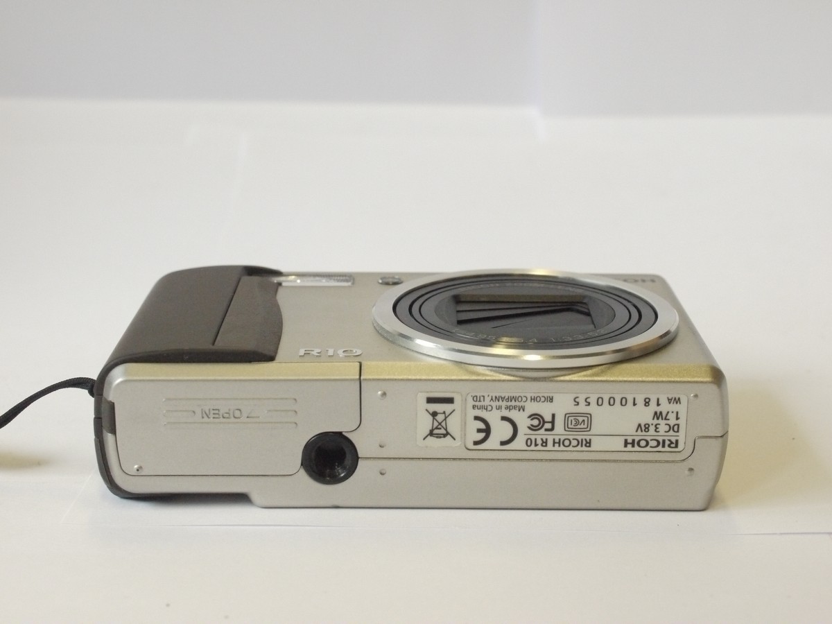 Ricoh R10 Compact 10MP Digital camera, silver coloured, with 4.95