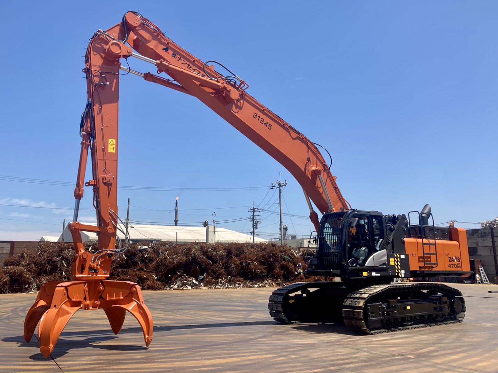 川崎ヤードに日立建機製油圧ショベル導入 – 株式会社ナンセイスチール