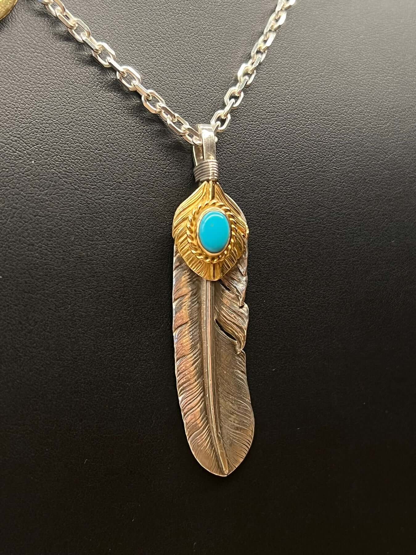 Goros Gold Top Gold Rope Turquoise Feather and Gold Sun Metal