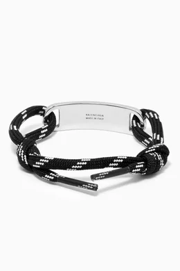 Buy Balenciaga Black Logo Plate Cord Bracelet in Brass & Cotton