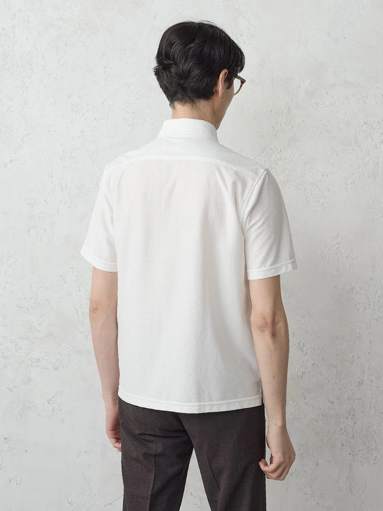 S．ブルー TRANS CONTINENTS プレーンポロシャツ ホワイト/サックス