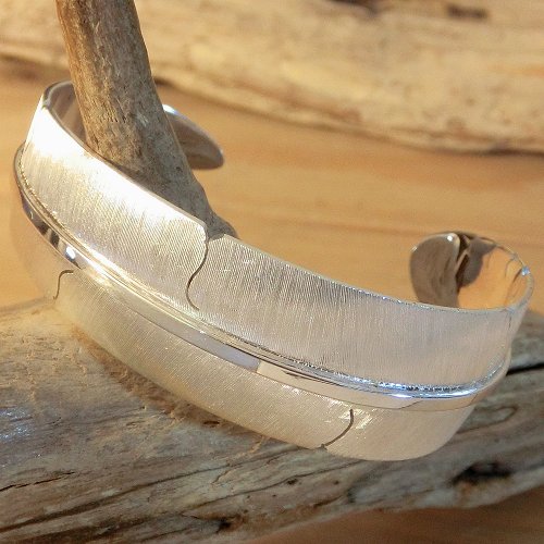 イスレタ族：マイケル・カーク（Michael Kirk）フェザー カフ