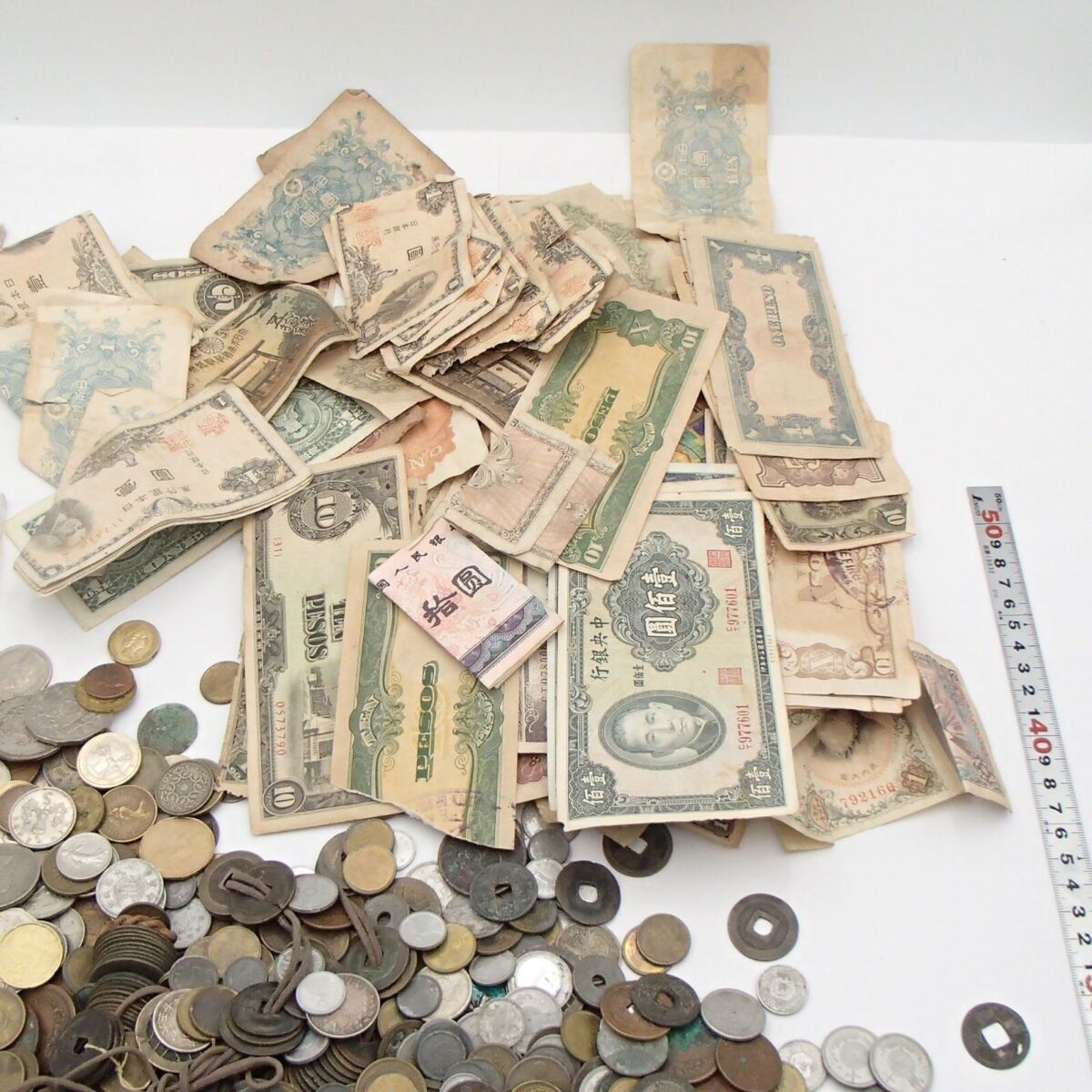 外貨も含んだ古銭を大量にまとめて高額買取しました！ 東京都のお客様