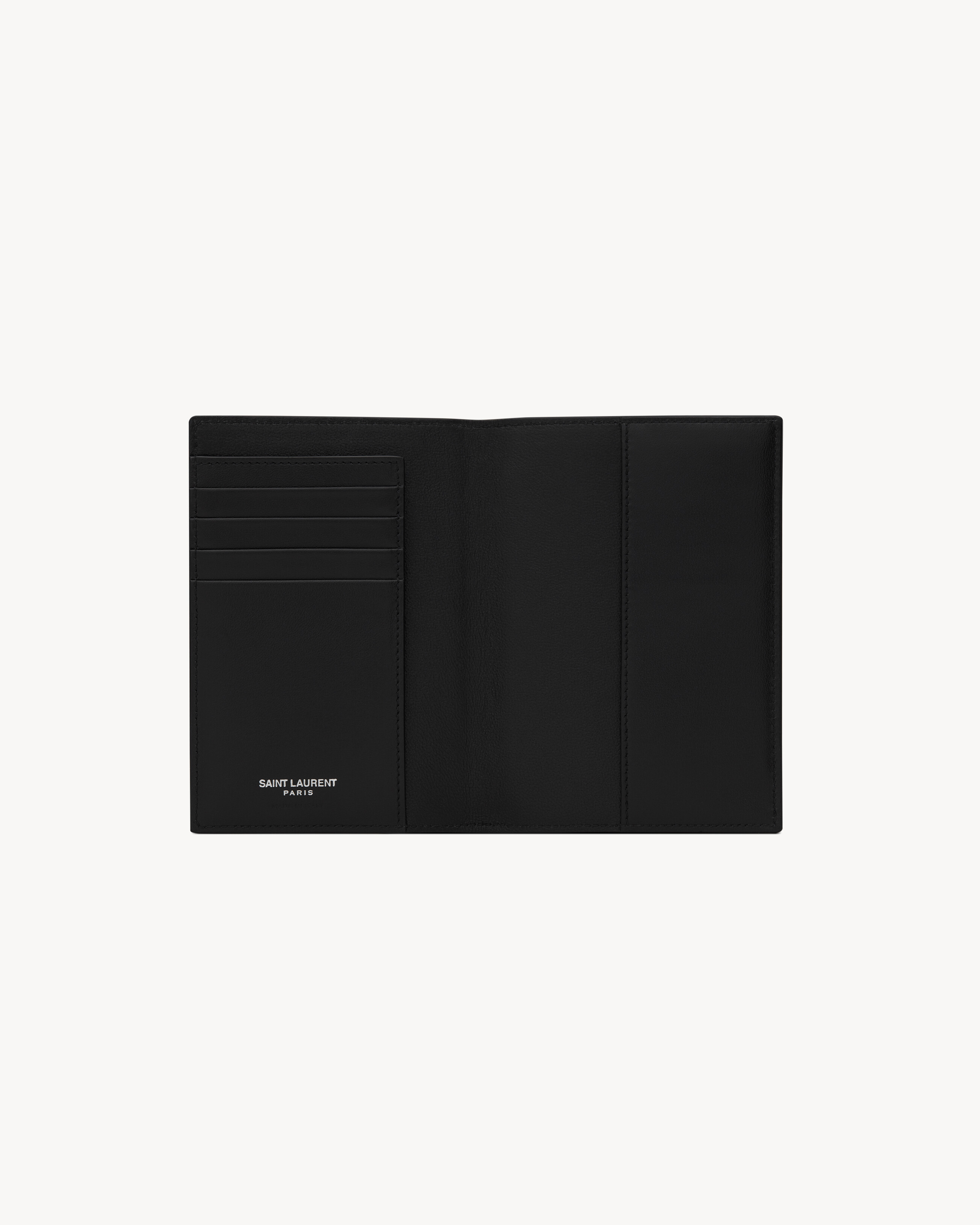 TINY CASSANDRE passport holder in matte leather in Black | Saint