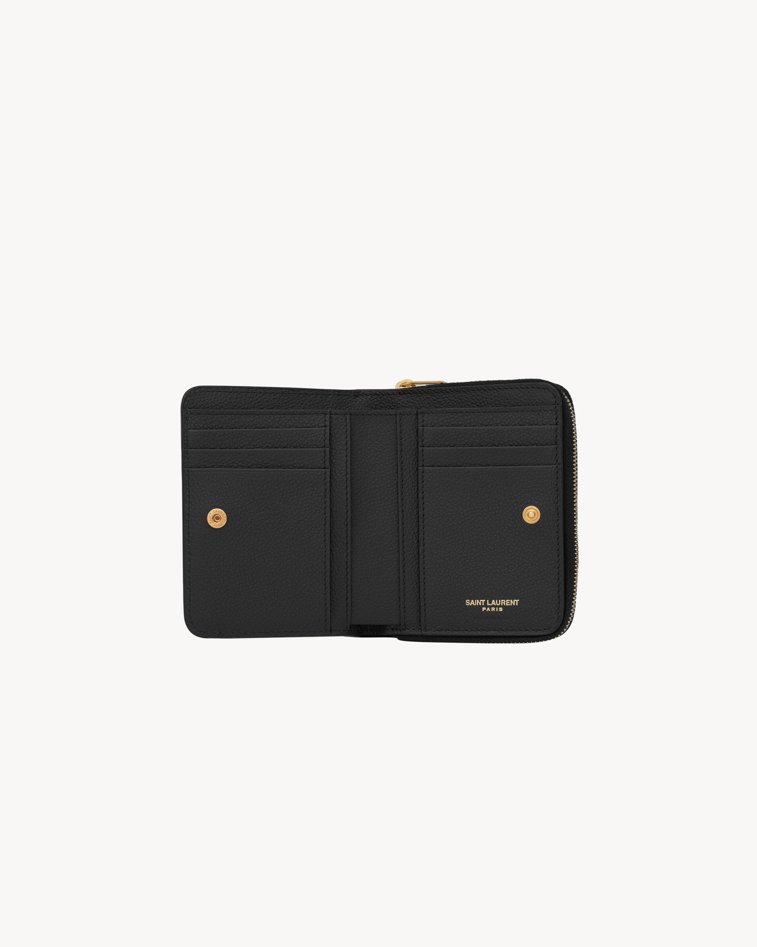 YSL LINE compact zippered wallet in grained leather in Black