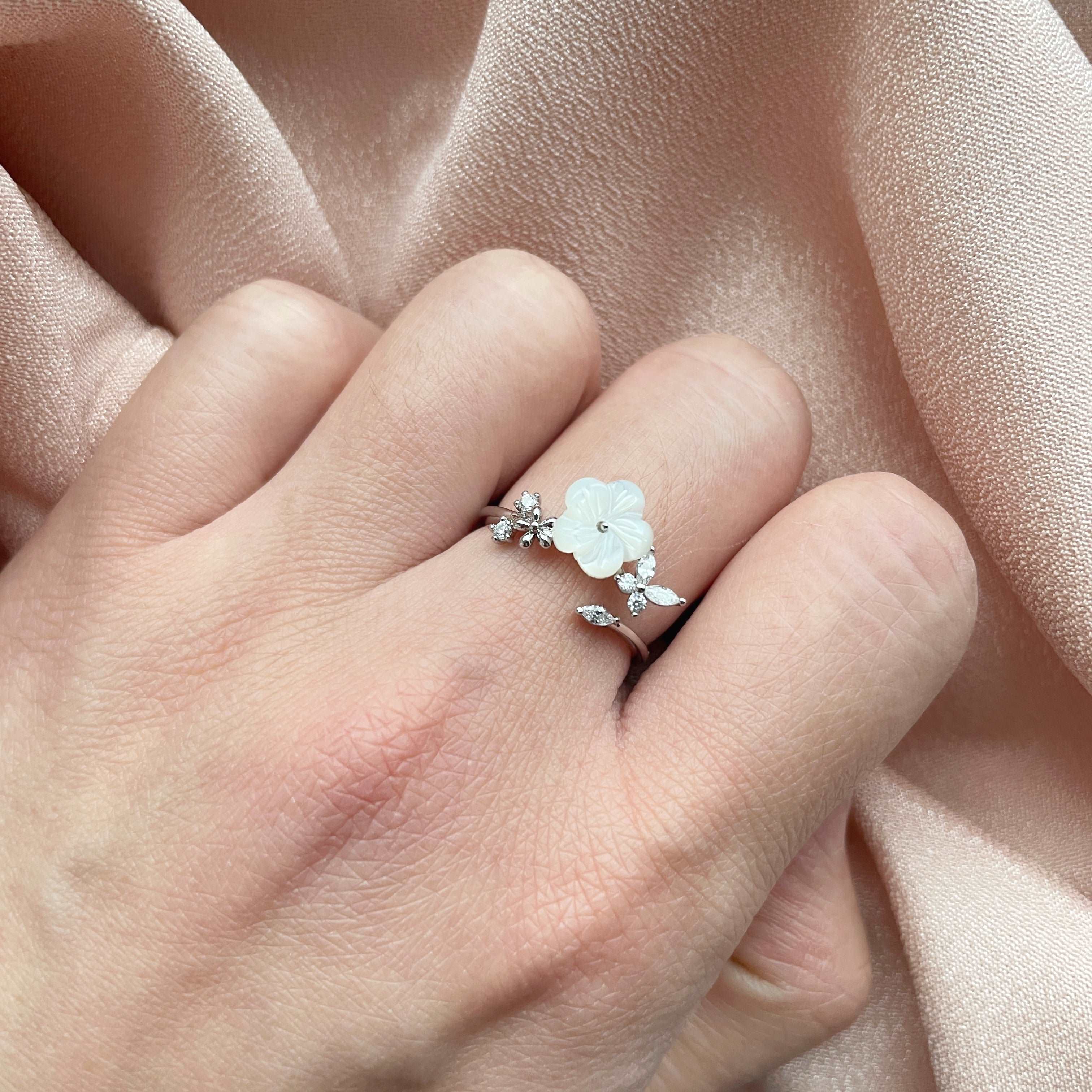 Check out our Mother-of-Pearl Petal Fantasy Silver Adjustable Ring