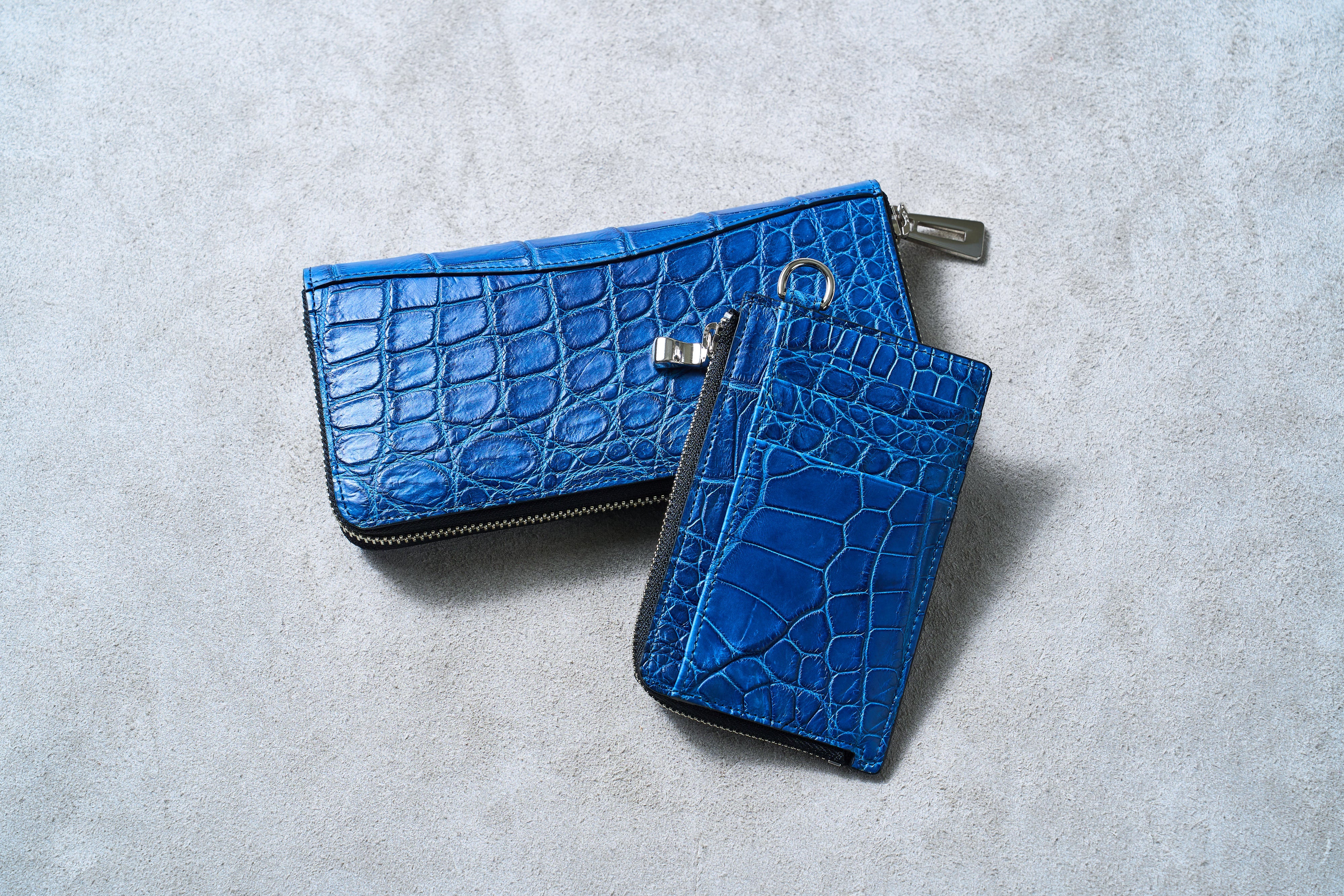 深藍に浮かぶ鱗の輝きー持つたびに惚れ直す“本物志向”のクロコダイル