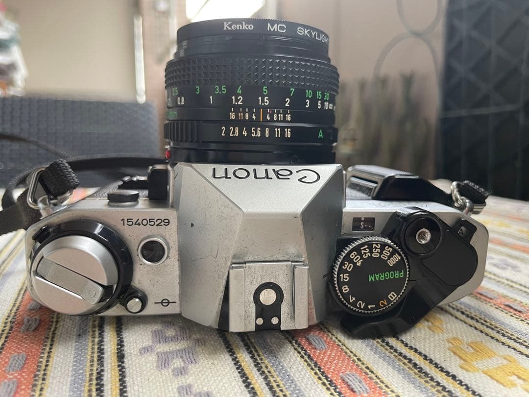 CANON AE-1 PROGRAM 50mm グリップ、シグマzoomレンズ付 - メルカリ
