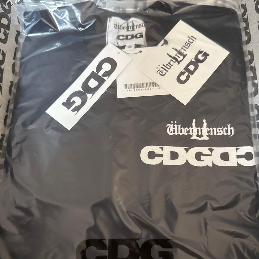 CDG x G-DRAGON Übermensch SYMBOL T-SHIRT - メルカリ