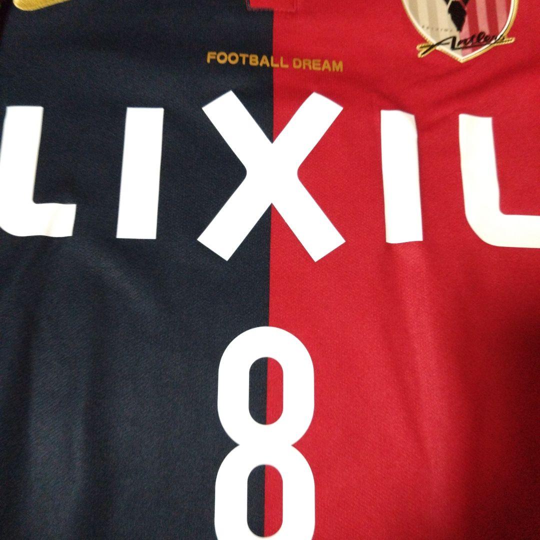 鹿島アントラーズ ユニフォーム 土居聖真 サイン入り 2016 - メルカリ