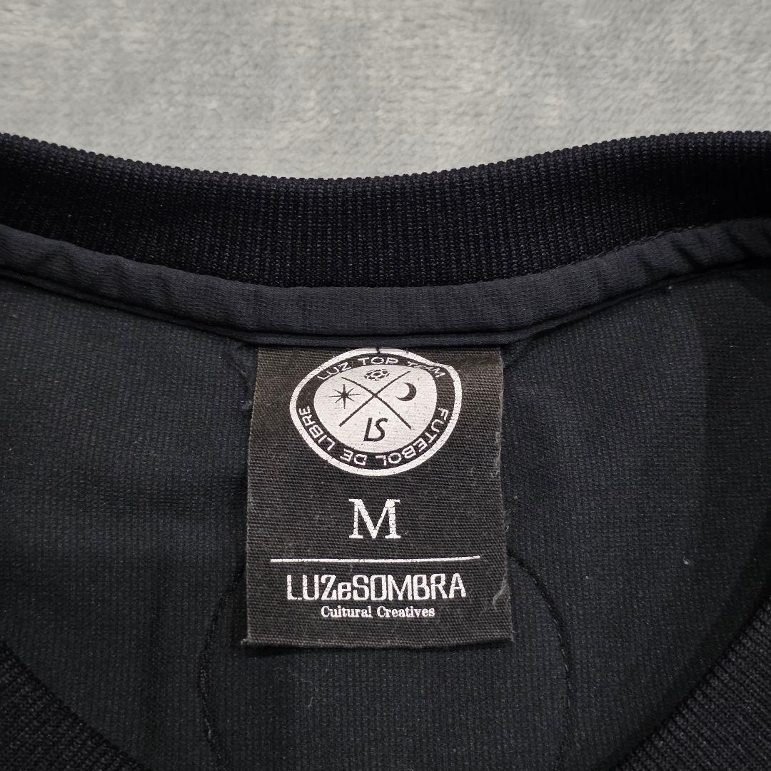 ルースイソンブラ トップチーム LTT プラシャツ M 黒 ドミンゴ - メルカリ