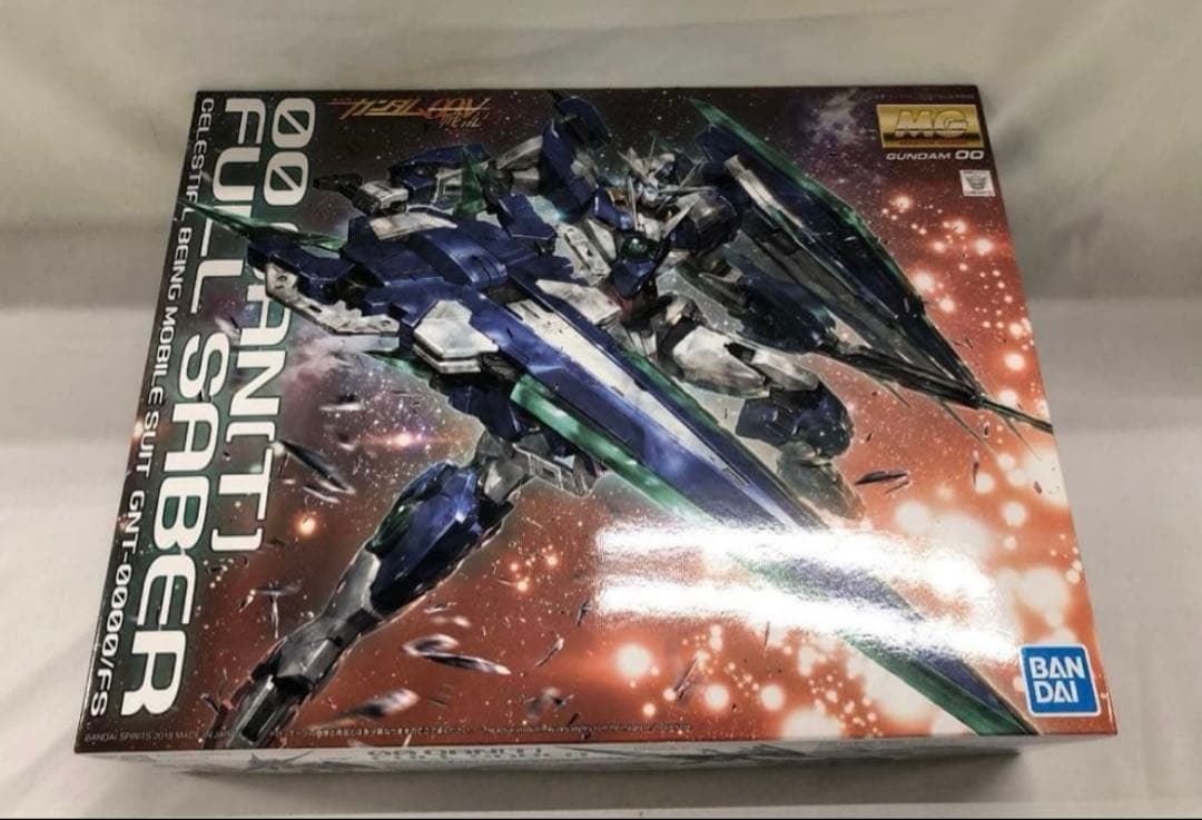 （未開封品）MC 1/100 ダブルオークアンタフルセイバー MG 1/100 ダブルオークアンタフルセイバー│株式会社BANDAI SPIRITS