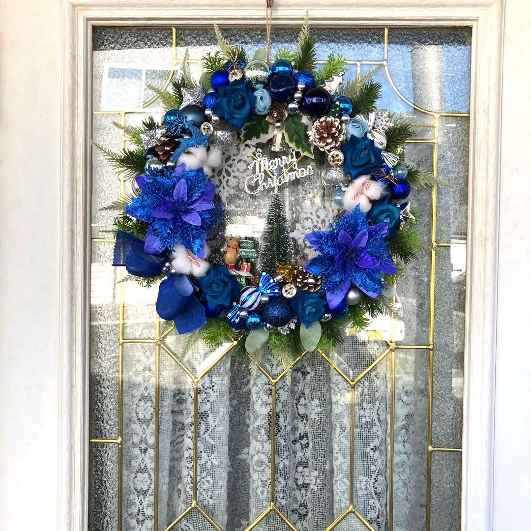 キリン様専用です。ロイヤルブルーポインセチアとローズのクリスマス