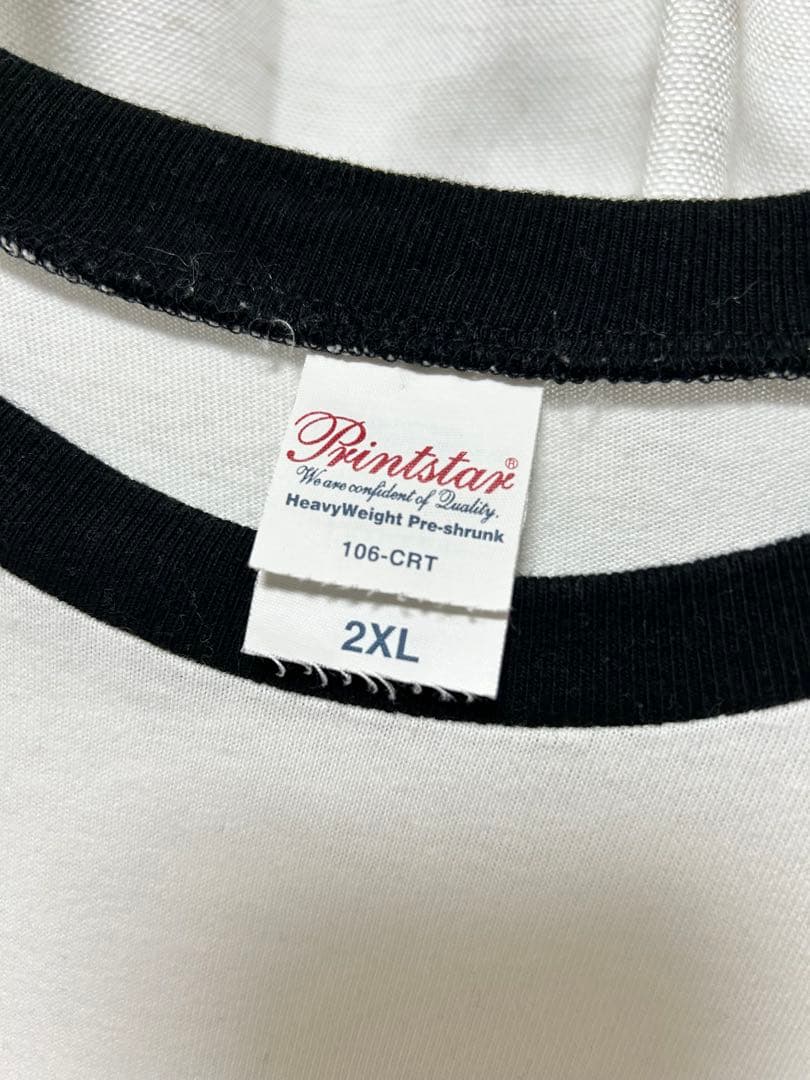 猫背のネイビーセゾン ラグラン Tシャツ