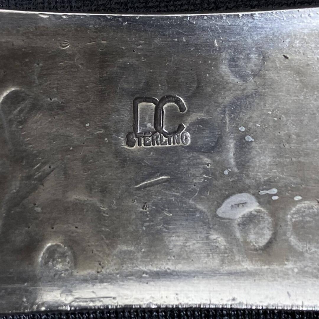 NAVAJO Derrick Cadman シルバースタースタンプワークバングル - メルカリ