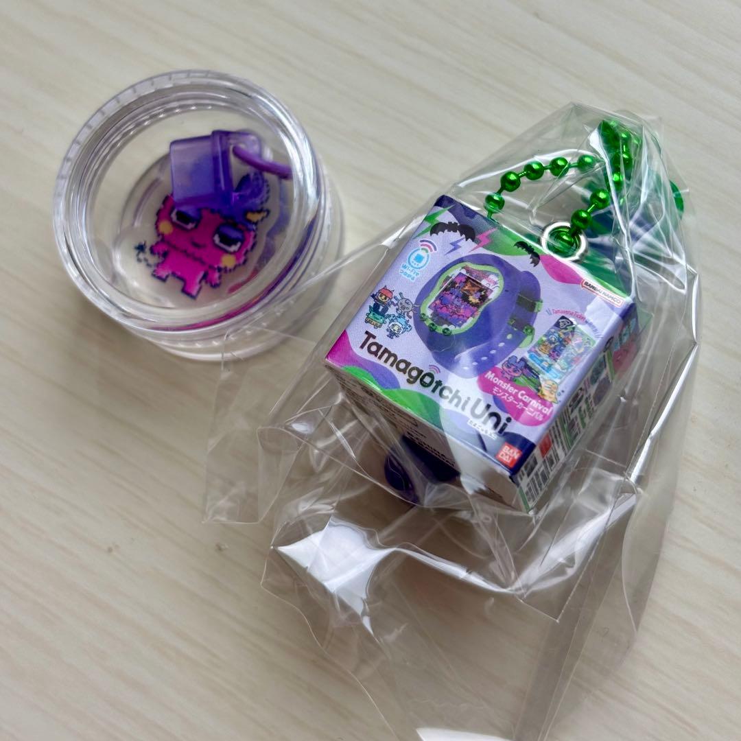 新品 たまごっちユニ モンスターカーニバル本体ダストプラグ付おかしなボーロっち