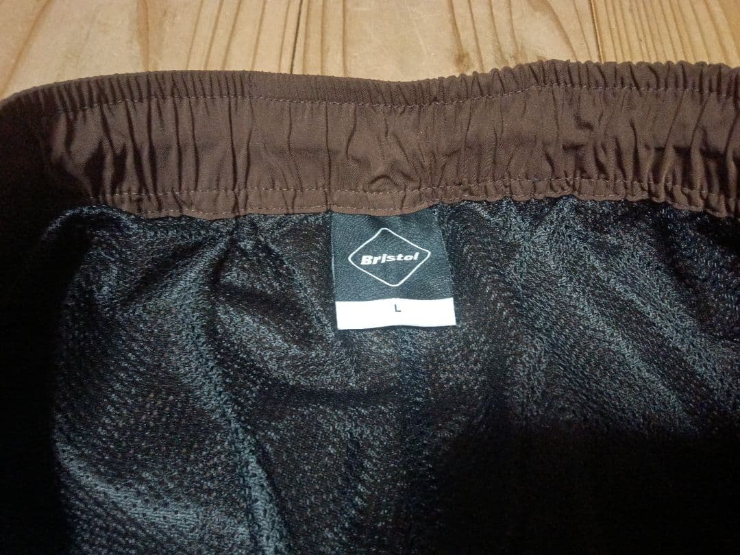 F.C.RealBristolSOPH.ウォームアップパンツブラウンブラックL - メルカリ