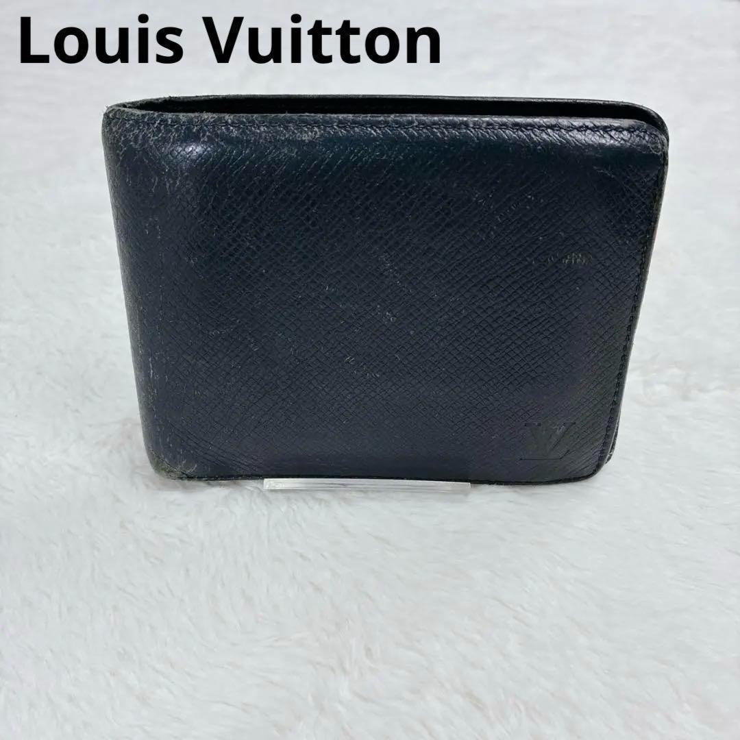 ルイヴィトン 二つ折り財布 タイガ ポルトフォイユ ネイビー メンズ