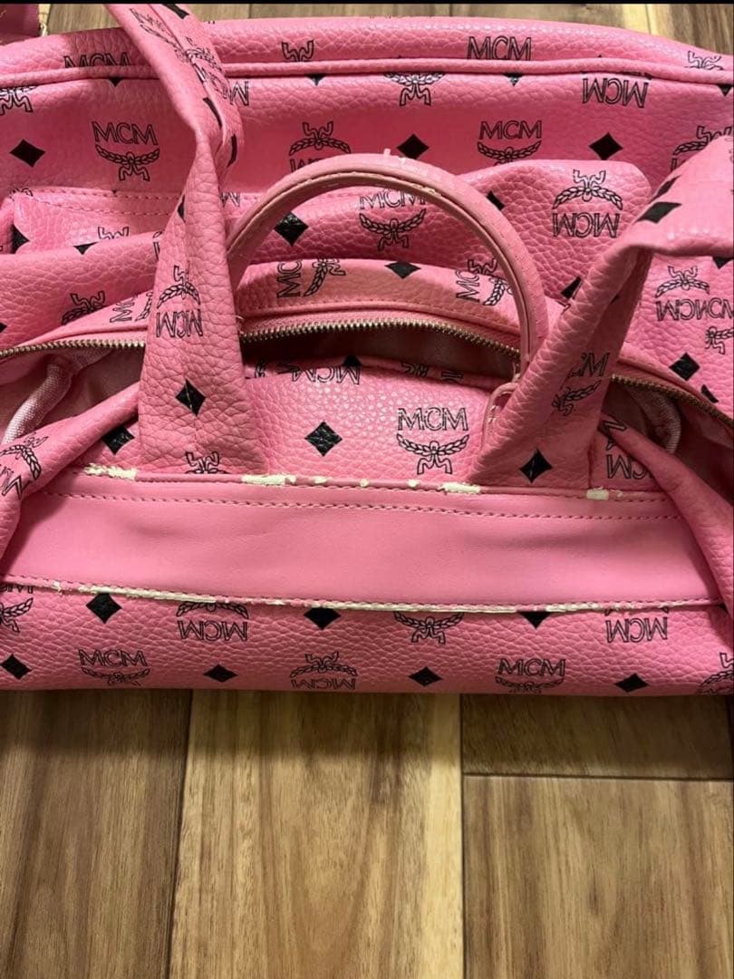 MCM ピンク リュック スタッズ付き - メルカリ