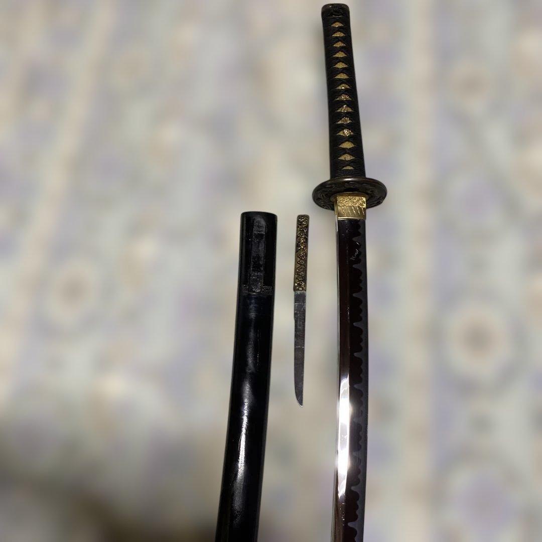 模造刀(小柄付) 黒柄 龍彫楕円鍔 黒呂鞘