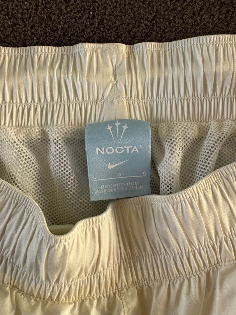 NIKE DRAKE NOCTA ナイキ ノクタ ナイロンパンツ 白 L ゴルフ - メルカリ