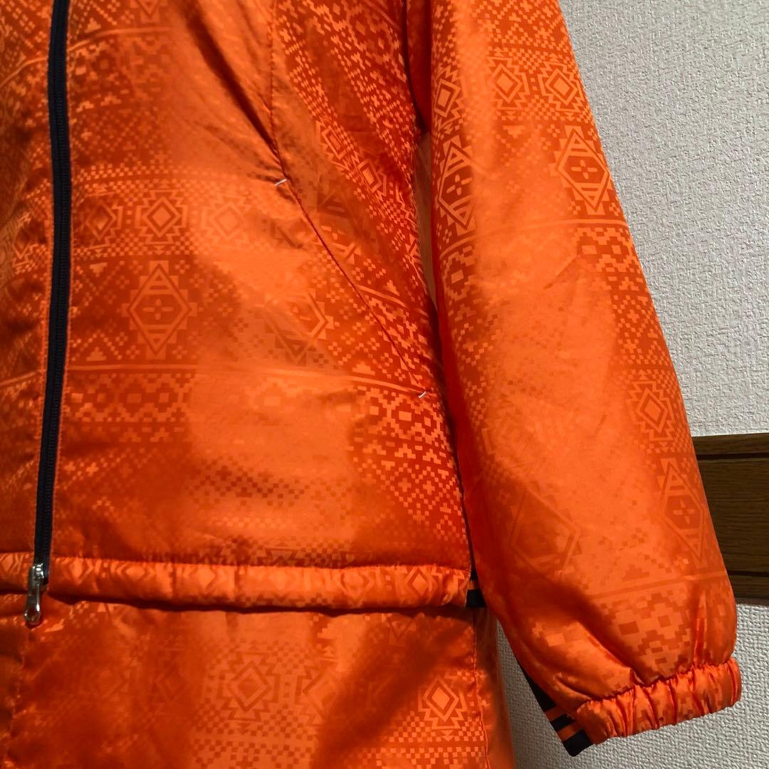 セットアップ マンシングウェア 中綿 パーカー スカート オレンジ 総柄