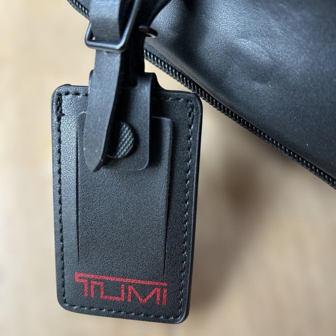 TUMI 96303214D0黒 レザー スリングバッグ - メルカリ