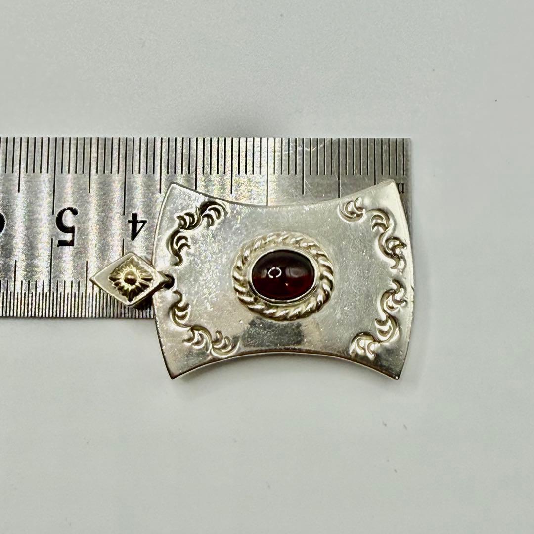 美品 アリゾナフリーダム k18太陽神付チャーム銀縄ガーネット