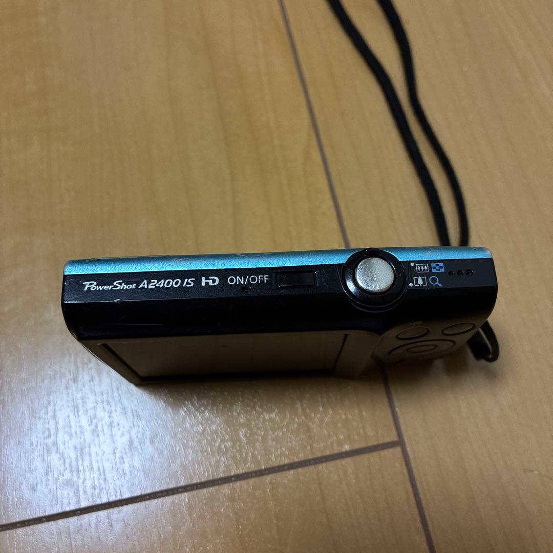 ジャンク】Canon PowerShot A2400 IS 水色＋充電器 - メルカリ