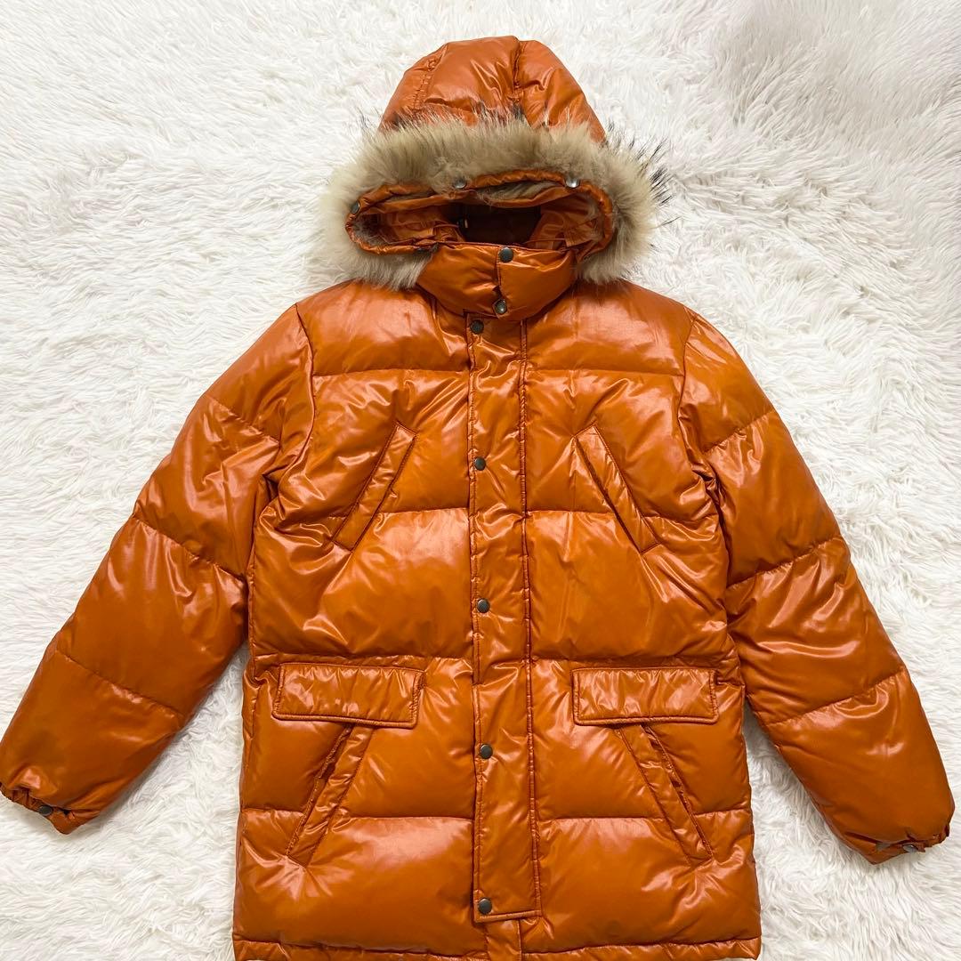 クリケット ラクーンファー ダウンコート オレンジカラー フード