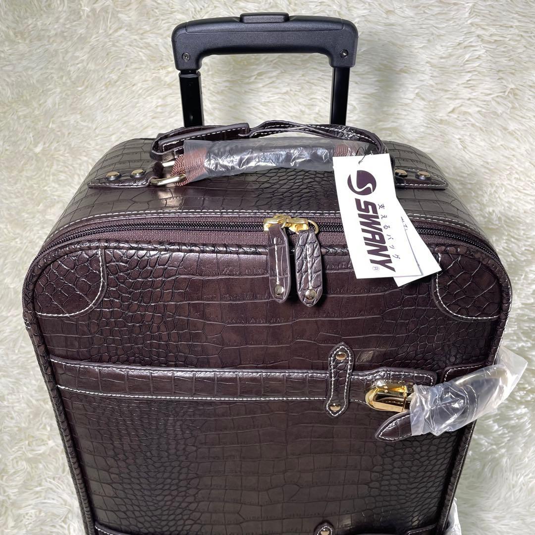SWANY スワニー クロコ型押し キャリーバッグ ダークブラウン - メルカリ