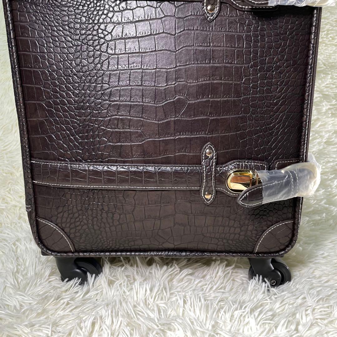 SWANY スワニー クロコ型押し キャリーバッグ ダークブラウン - メルカリ