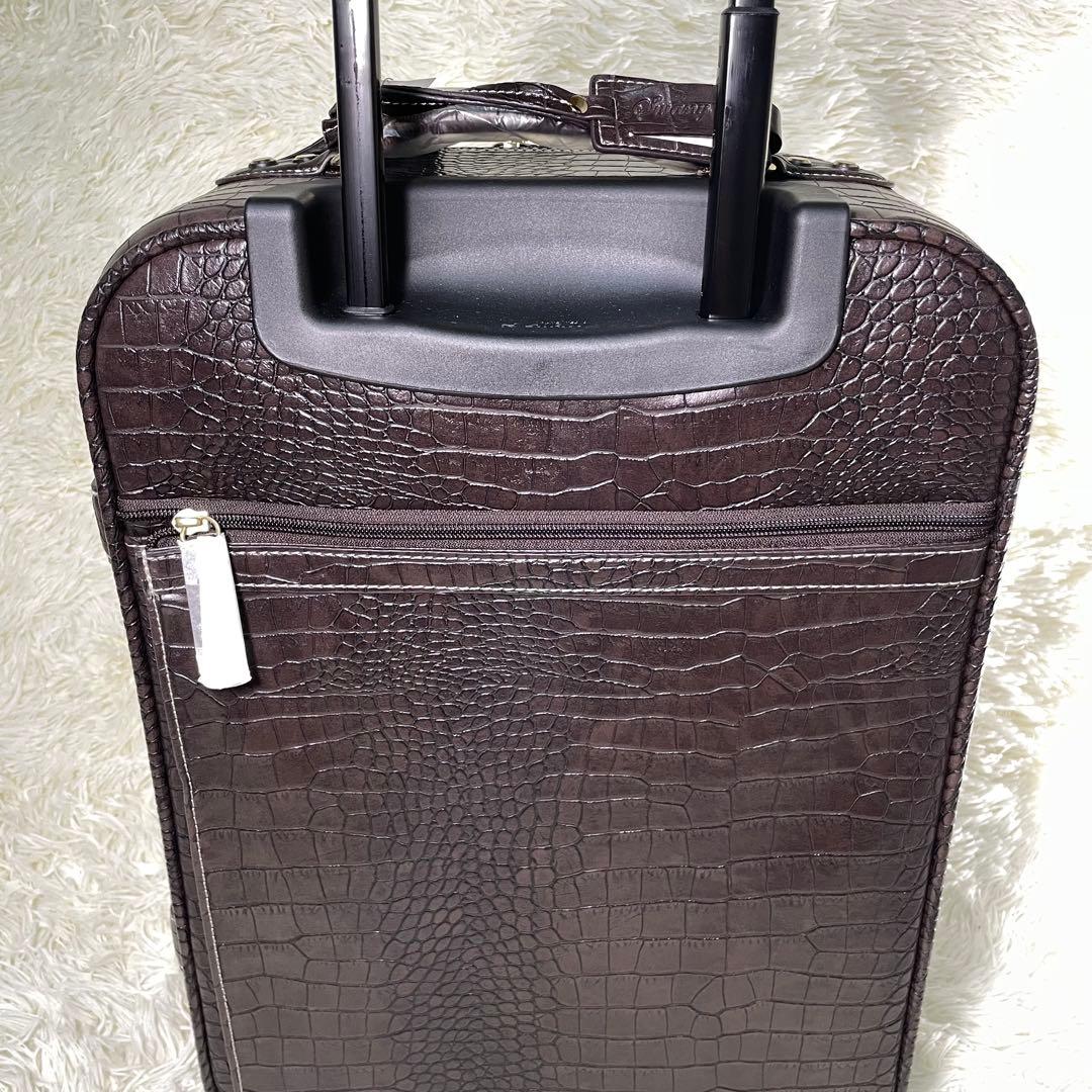 SWANY スワニー クロコ型押し キャリーバッグ ダークブラウン - メルカリ