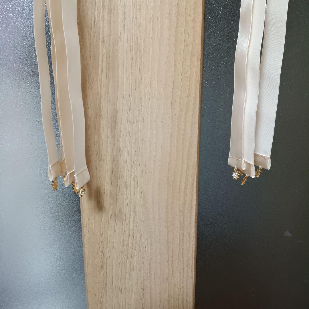 お買い得 羽バングル&リボンフロート - メルカリ