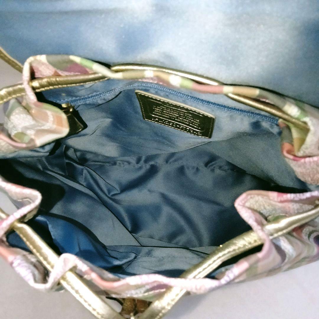 希少美品】 コーチ シグネチャー リュック ポピー マドラス COACH