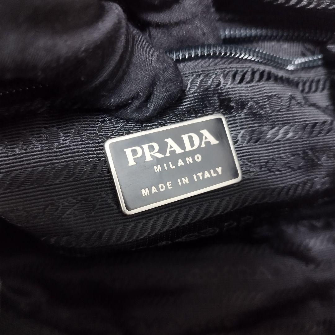 美品☆ プラダ リュック ベルト フラップ 三角ロゴプレート レザー