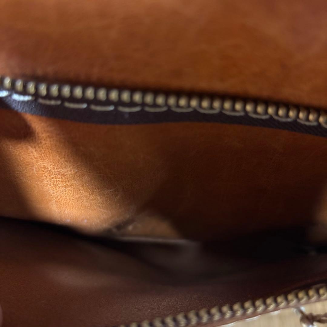 ヘルツ わんぱくリュック がま口 レザー バックパック ロック金具 鍵