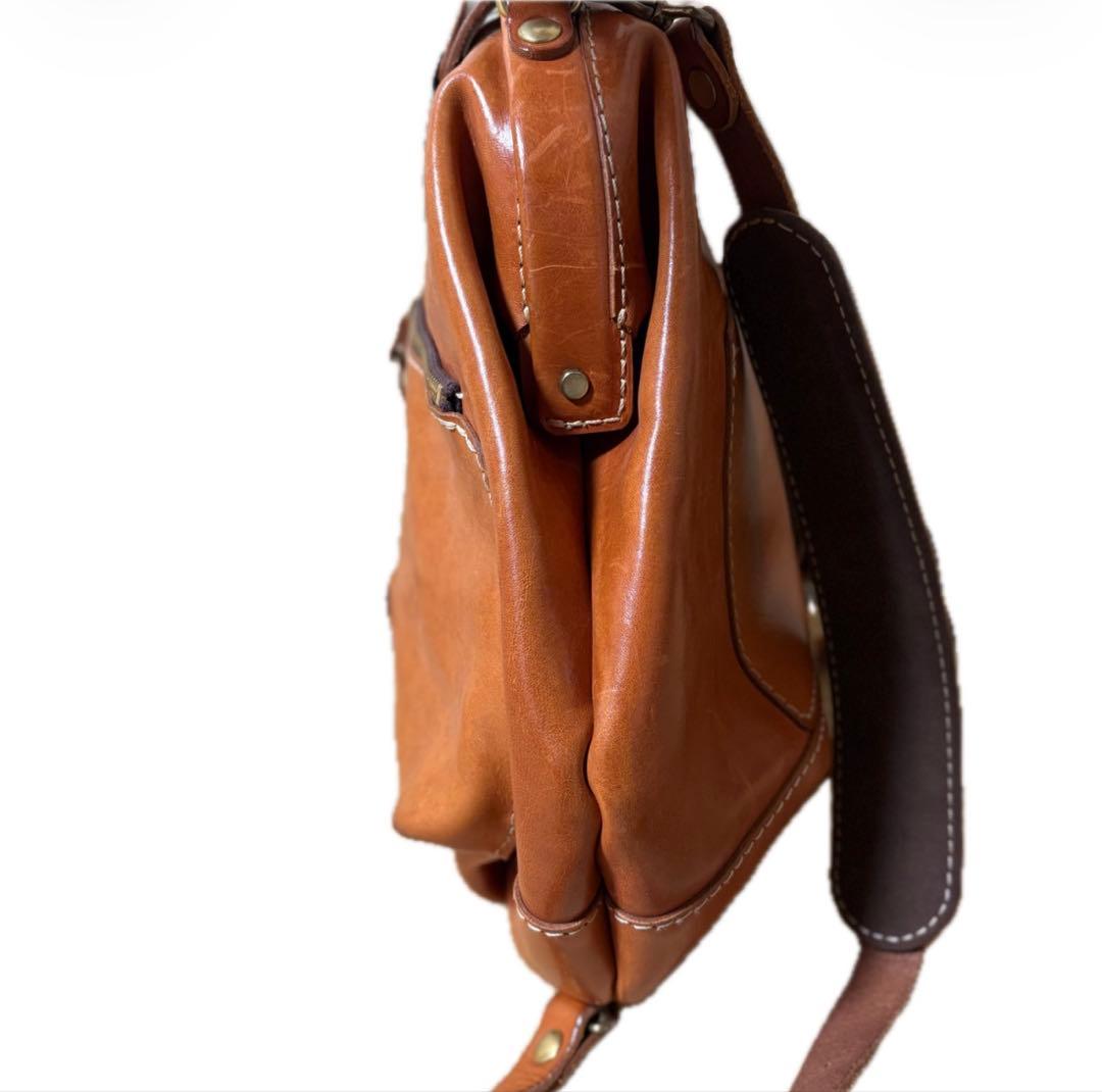 ヘルツ わんぱくリュック がま口 レザー バックパック ロック金具 鍵