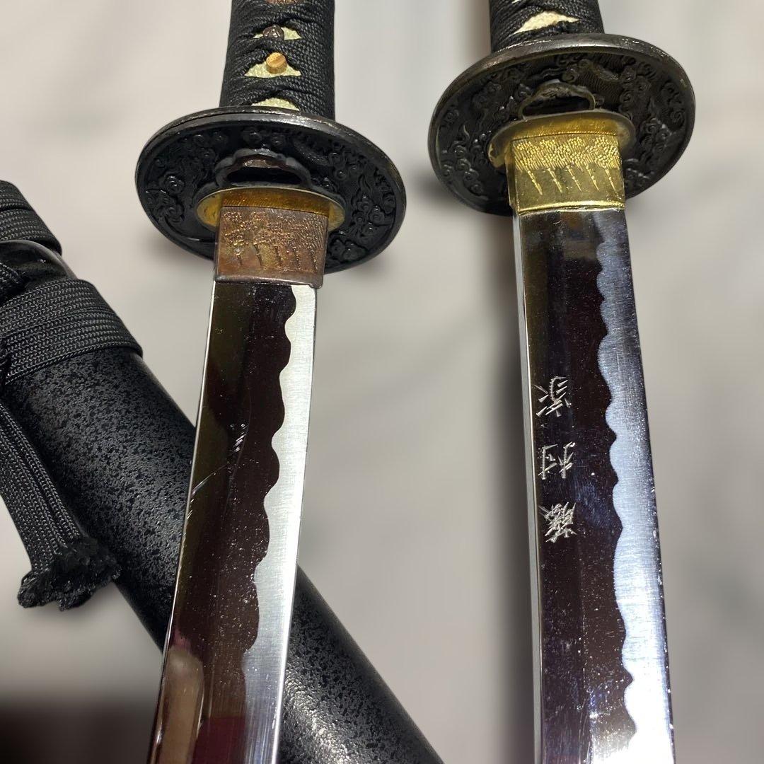 割安模造刀大小2本 黒柄 雲龍楕円鍔 黒梨地鞘 - メルカリ