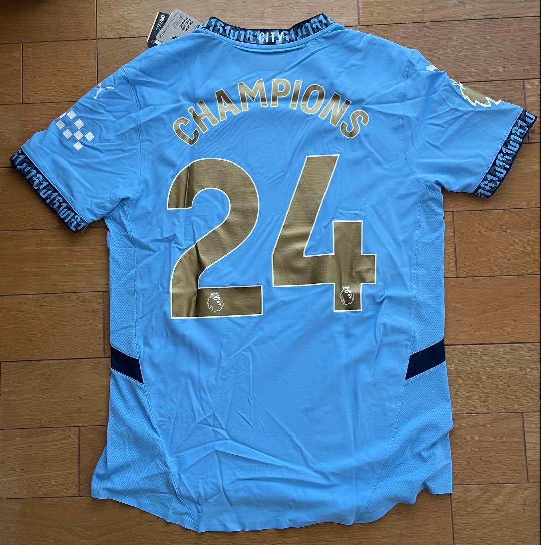 【未使用美品】マンシティ2023-24四連覇優勝記念ウェア　シリアル番号161 未使用美品】マンシティ2023-24四連覇優勝記念ウェア シリアル番号161