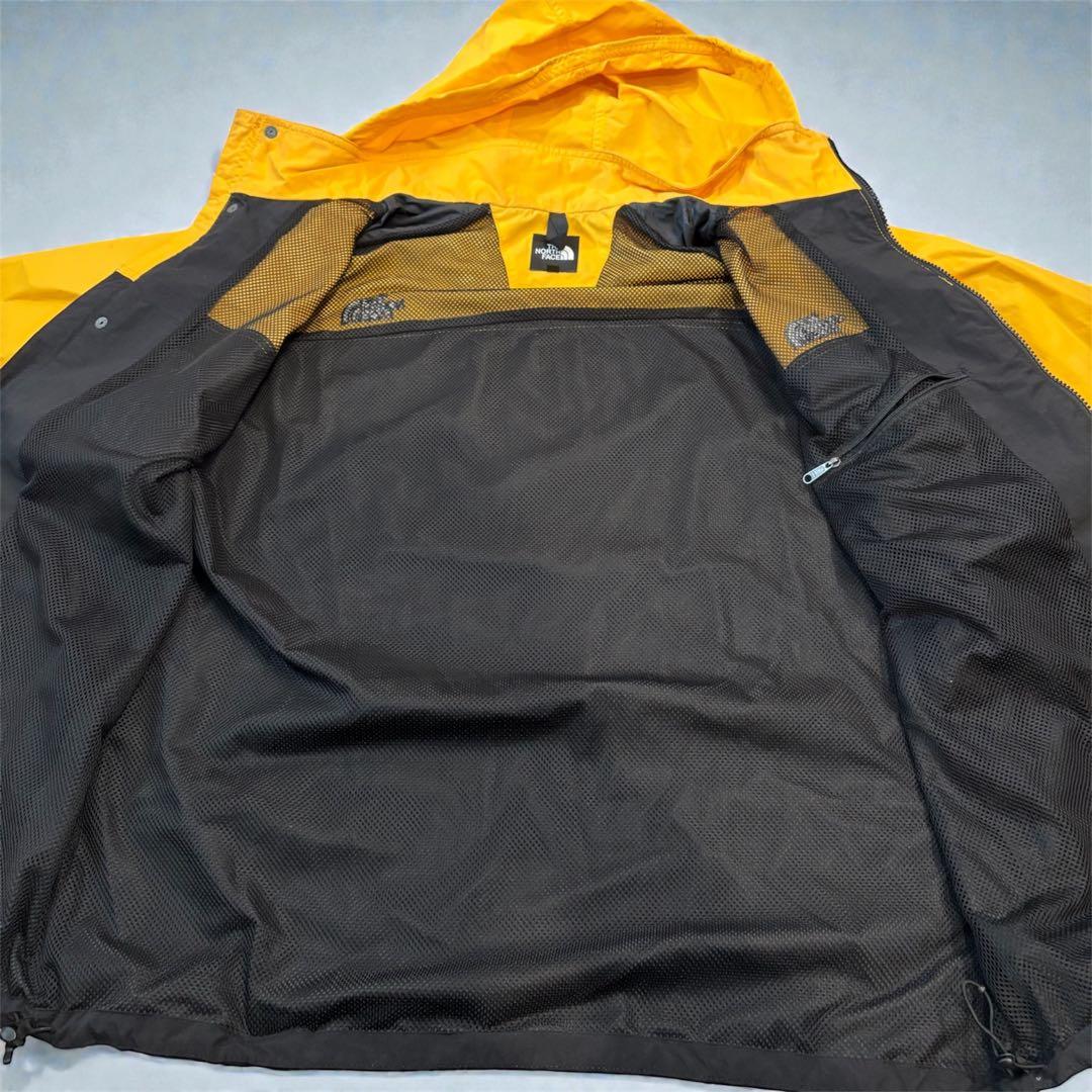 THE NORTH FACE マウンテンパーカー イエロー/ブラック - メルカリ